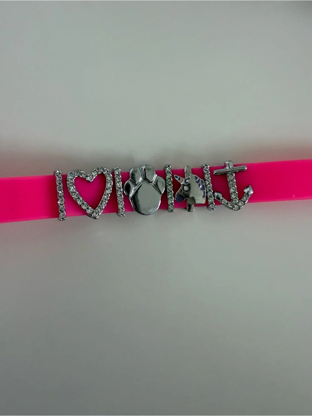 KEEP Collective Hot Pink Adjustable Silicone Bracelet with Silver Charms